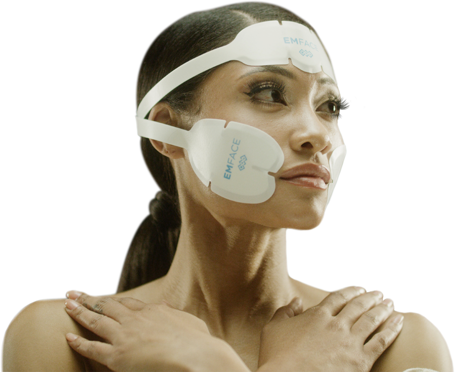 Woman wearing the EMFace forehead and cheek applicators