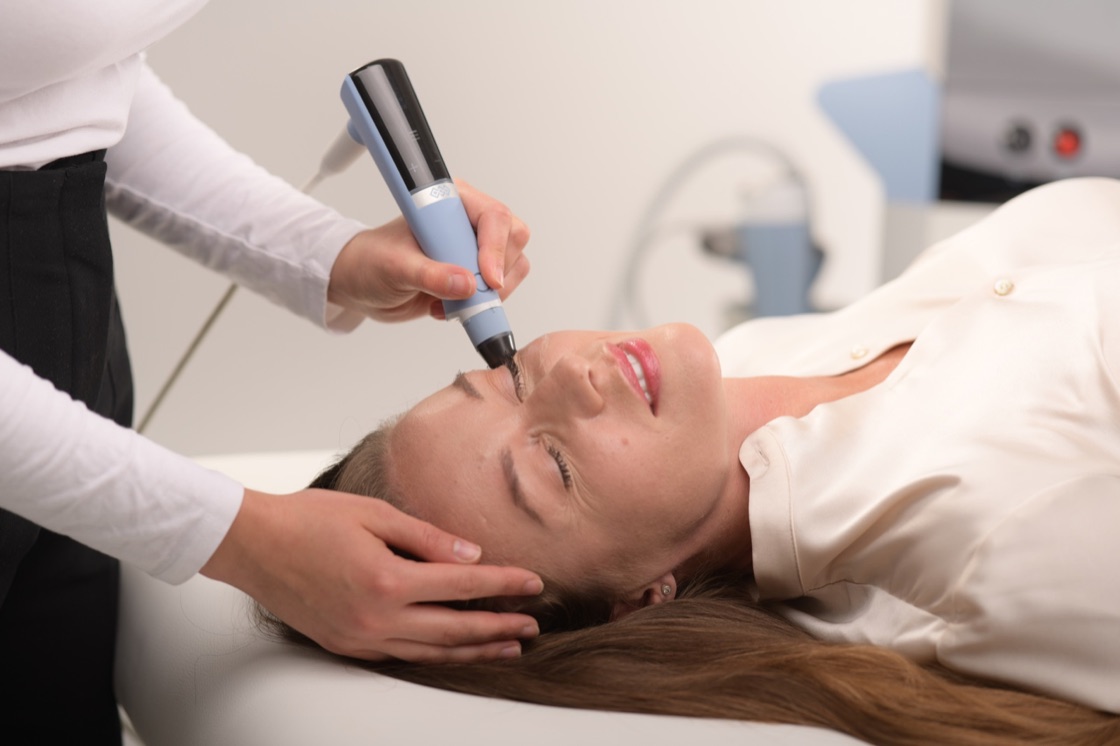 EXION facial treatment being delivered at Victoria Wellness Clinic